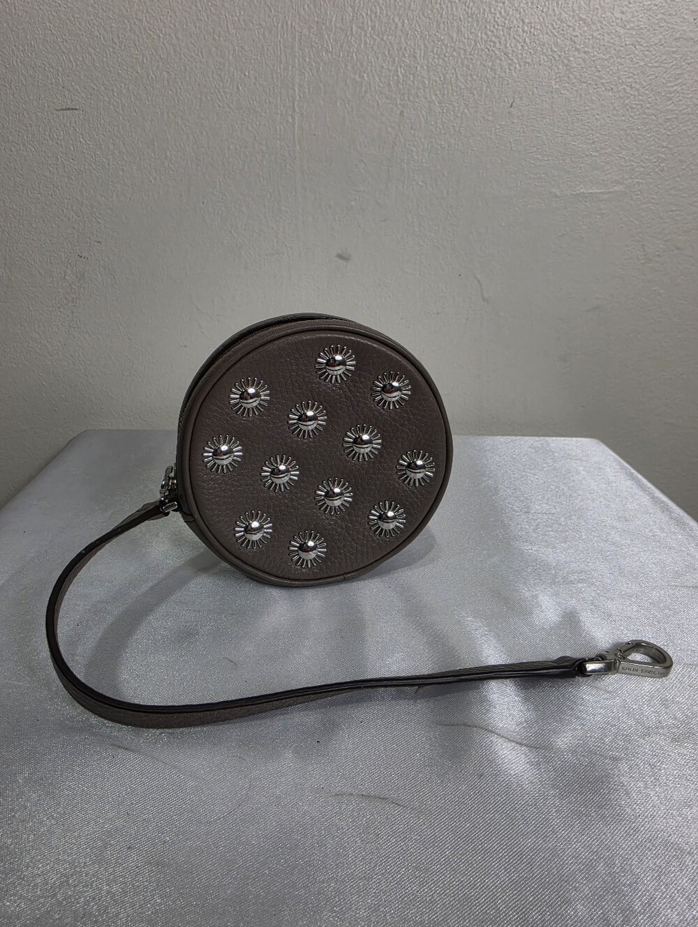 Michael Kors Round Brown Leather Wristlet with Silver Stud Accents